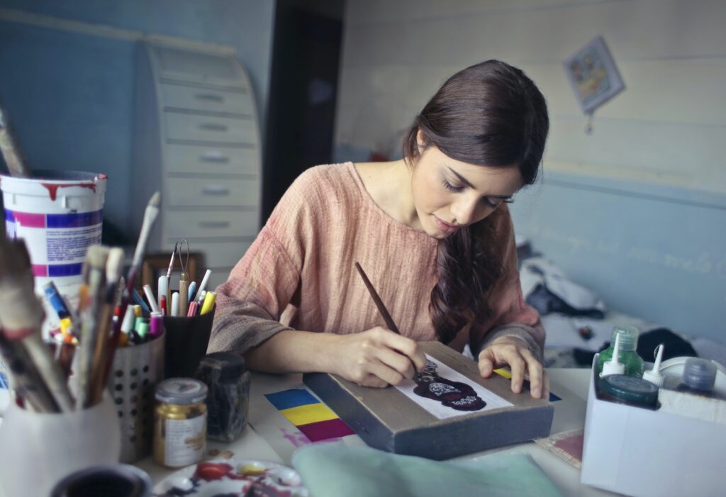 Woman in Brown Scoop-neck Long-sleeved Blouse Painting